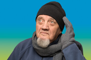portrait homme âgé bonnet et gants