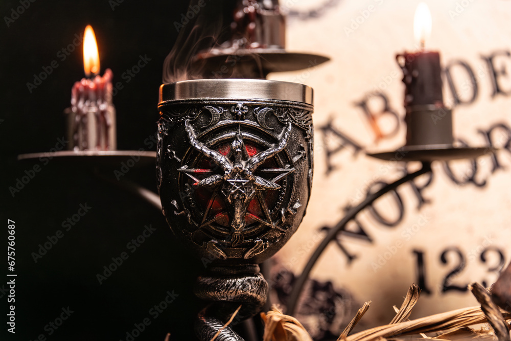 Sticker Magic still life with burning candelabrum, evil candles. Black magic ritual with occult, evil and esoteric symbols.