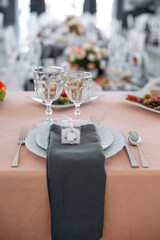 Table set for wedding or another catered event dinner. Selective focus