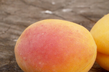 Apricots on a wooden board