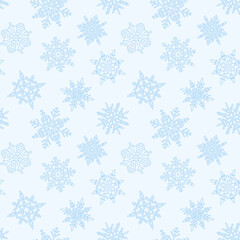 Christmas seamless pattern of snowflakes, blue on white background.