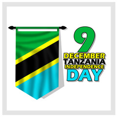 Tanzania Independence Day banner, a hanging Tanzanian flag, with bold text on a white background to commemorate December 9th