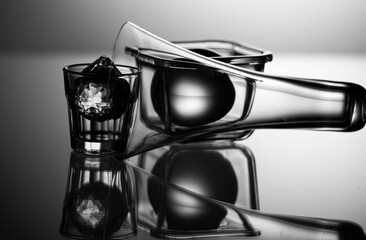 Abstract compositions of glass objects with reflections