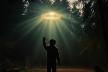 Rolgordijnen Child in Forest Mystically Abducted by UFO, Beam of Light Pulling Him Upward © Fortis Design