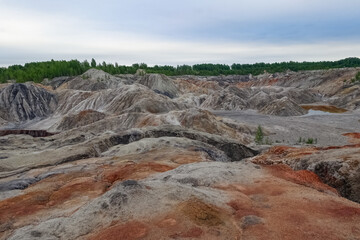 Ural Mars. An extraordinarily beautiful summer landscape with red lakes, colorful slopes and...