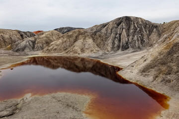 Ural Mars. An extraordinarily beautiful summer landscape with red lakes, colorful slopes and...