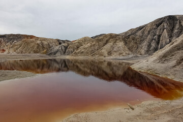 Ural Mars. An extraordinarily beautiful summer landscape with red lakes, colorful slopes and...
