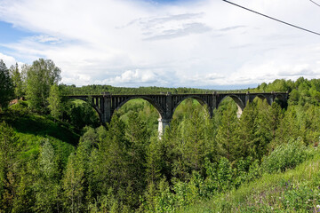 Railway bridge across the river in the south of the Kama region. The old Big Sars viaduct. The...