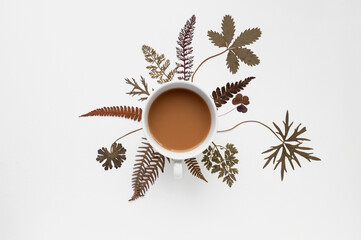 Obraz premium cup of tea with dried leaves