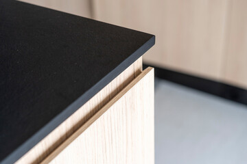 Close up detail of black stone kitchen countertop