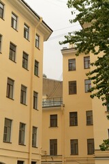 Fototapeta premium St. Petersburg, Russia, October 28, 2023. Fragment of the facade of a residential building in the constructivist style. 