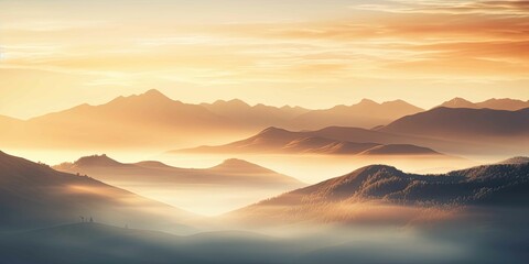 Fototapeta na wymiar sunrise in the mountains over morning fog