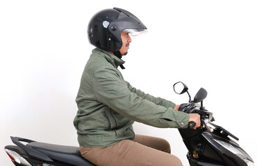 Side view of asian man driving motorcycle. Isolated on white background