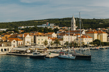 Fototapeta na wymiar Amazing view of yacht marina and old town Supetar, Brac island, Croatia.