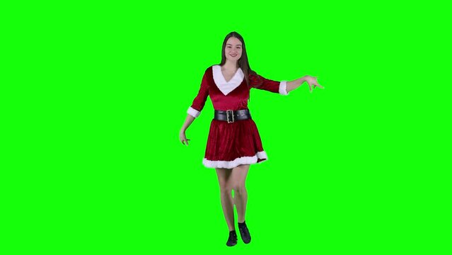 Carefree vivacious woman dancing in front of green screen xmas Christmas Eve Female celebrate New Year feel alive and happy party