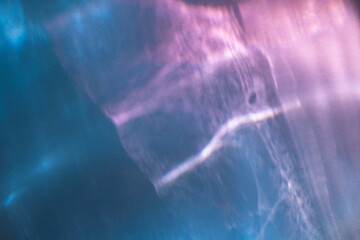 Abstract pink and blue water ripple texture overlay. Summer copy paste background