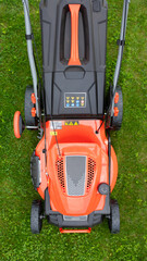 powerful lawn mower on the grass, top view