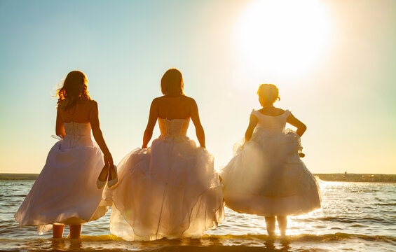 brides at sunset