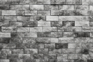 Black and white photo of brick wall with grungy effect.