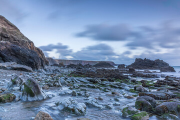 Marloes Sands, Pembrokeshire, Wales at dusk with cloud and looking moody at high tide