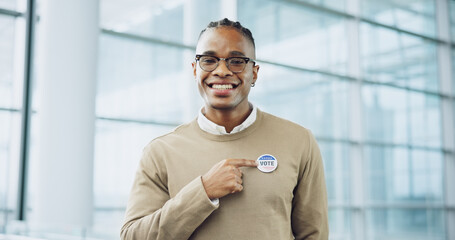 Man, portrait and badge for vote, smile and confidence or button, proud and choice in politics. Black person, happy and support for elections, democracy and party in registration for human rights