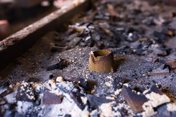 Remains of knocked out casting molds in the workshop of metallurgical plant