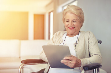 Happy, wheelchair and senior woman with a tablet, connection and typing with communication. Health, mature female person and elderly lady with recover, rehabilitation and technology for social media