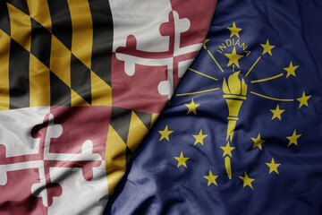 big waving colorful national flag of indiana state and flag of maryland state .