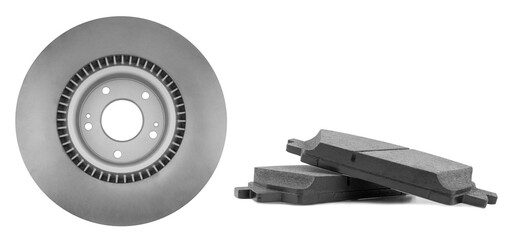 Car brake disc and brake pads isolated on white background. Auto spare parts. Perforated brake disc...