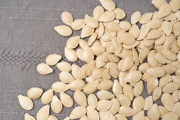 Whole Pumpkin Seeds in Shell Isolated, Raw Pepita Grains, Scattered Green Healthy Nuts