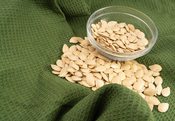Whole Pumpkin Seeds in Shell Isolated, Raw Pepita Grains, Scattered Green Healthy Nuts