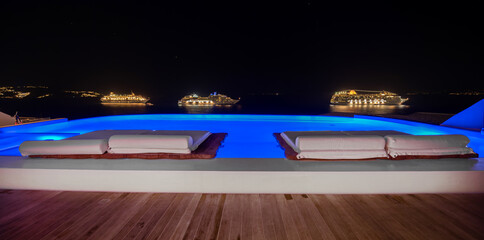 Fototapeta na wymiar Night at infinity pool view, Mykonos, Greece