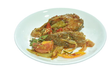 deep fried slice mango fish with tomato and chili in sweet sour sauce on plate 