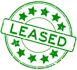 Grunge green leased word with star icon round rubber seal stamp on white background