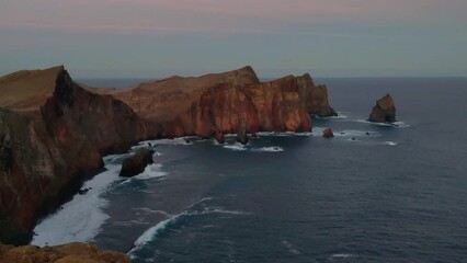 Beautiful sunset overlooking the rocky coast of Madeira Island