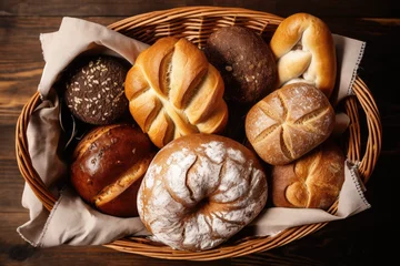 Foto op Canvas Beard, buns, muffins, bread loaves, bread rolls and pastry a basket, delicious freshly baked breads and pastries in a wicker basket from above, top view, flat lay, organic baking concept © Prime Lens