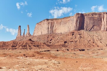 Fototapeta premium The famous Three Sisters formation as seen on the Monument Valley Scenic Drive
