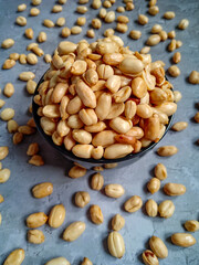 Kacang Goreng or fried peanuts which are given garlic seasoning with salty and savory flavor. Indonesian traditional snack.