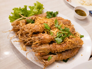 Deep fried crayfish with topping garlic
