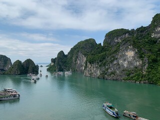 The archipelago in Ha Long Bay is majestic with islands and blue sea water
