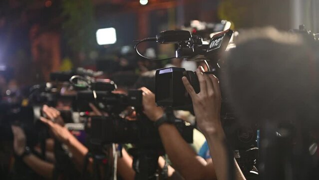 4K View of press and media camera working on public news