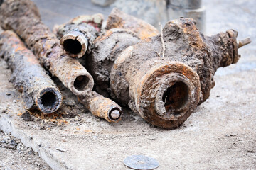 Detail shot with old and rusty drinking water pipes