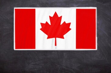 Hand drawn flag of Canada on a black chalkboard
