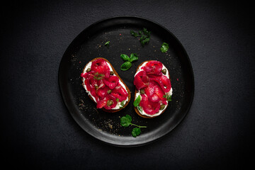 Sandwiches with gravlax salmon, cream cheese, capers, greens, breakfast, homemade,
