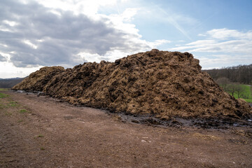 Agricultural fertilizer pile in the country field