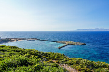 View of the landscape and the Mediterranean Sea from a mountain on the Greek island of Kos.	