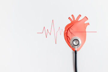 Stethoscope placed on heartbeat icon for checking the function of the patient heart. medical check up, heart attack, cardiology, help from specialist.