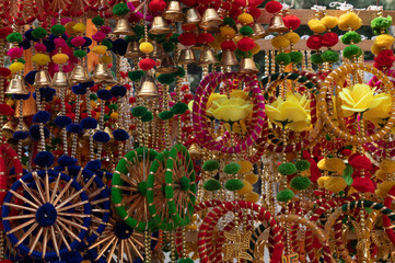 Fototapeta premium Mumbai , India - 9 November 2023, Home decoration items souvenir for sale during diwali festival time at malad west Mumbai India