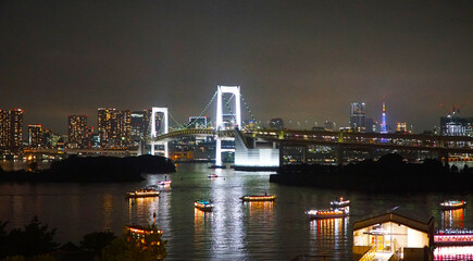 Fototapeta na wymiar Rainbow Bridge and Tokyo Bay at Night. Odaiba, Japan.