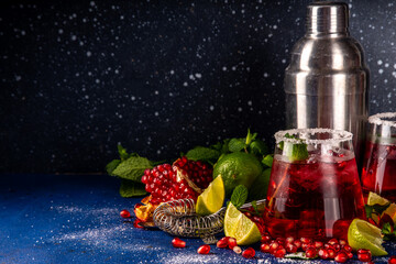 Pomegranate mocktail or cocktail, Boozy alcohol pomegranate and lime drink, lemonade, mojito,...